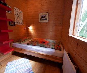 zweites Schlafzimmer mit Einzelbett im Haus Hubi
